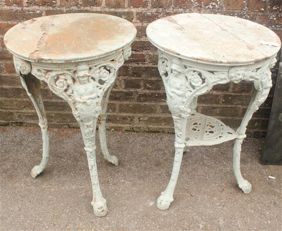 Pair of cast iron circular tables